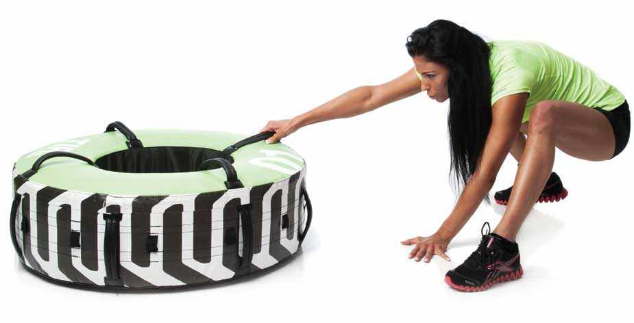 Training tyre 100kg220lbs TIYR Black with bold black and white lettering, lime green top and black handles