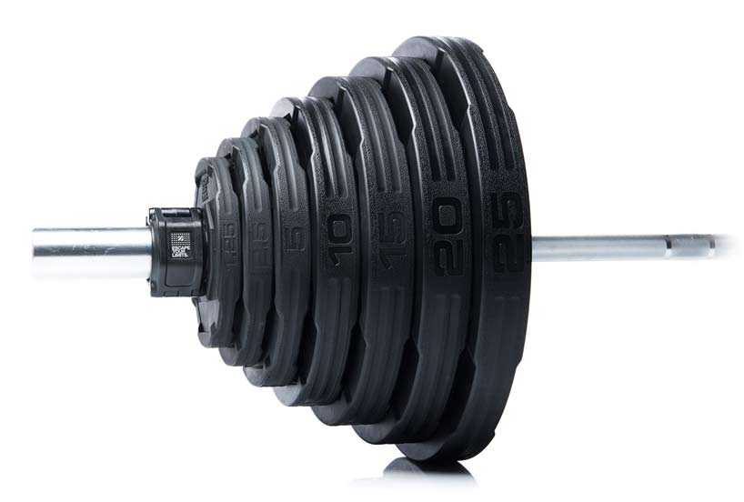 2.5lb Nucleus Urethane Grip Disc, black urethane plates with raised weight numbers and textured grip edges stacked on a bar