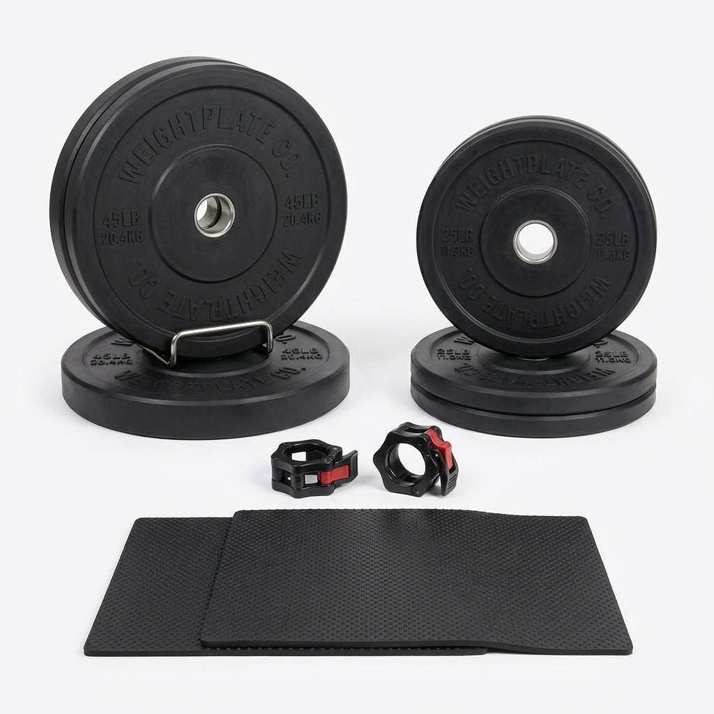 7 ft Olympic power bar is not visible; black weight plates, two black and red collars, and a textured mat are shown