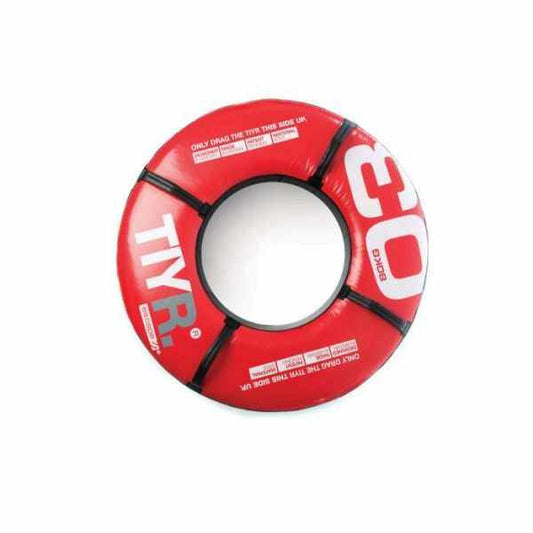 Training tyre for whole body strength in red synthetic material, with a solid finish, central opening and black handles